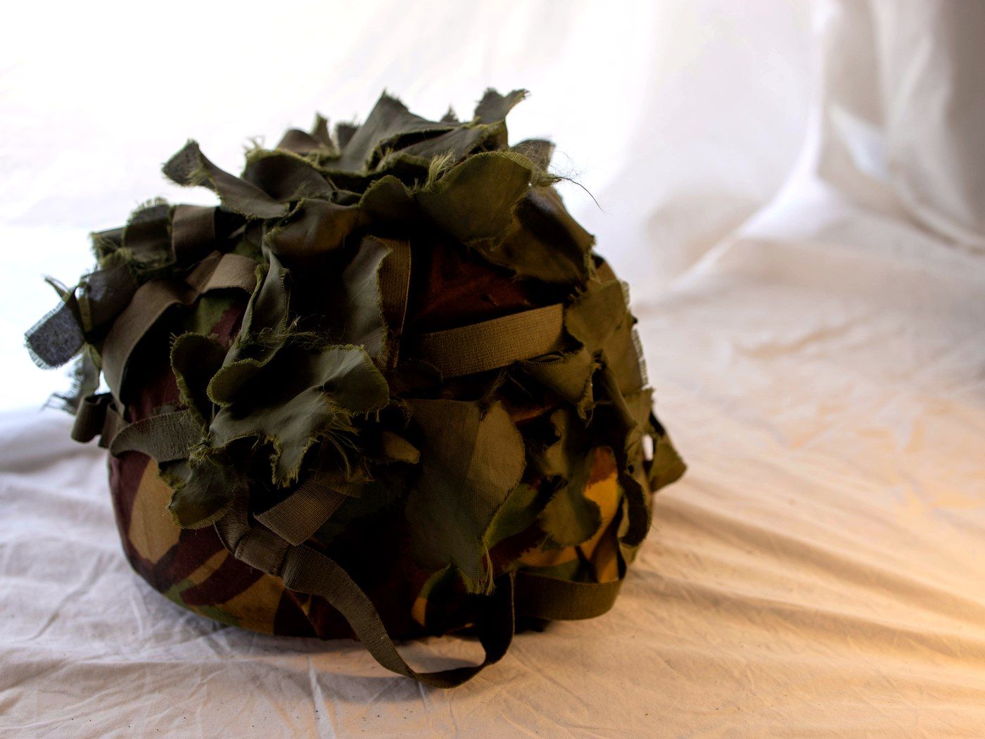 Steel Helmet with Foliage Scrim Cover